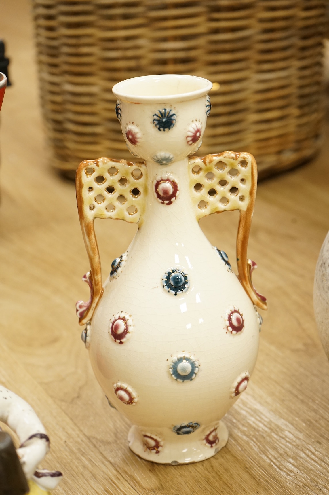 A collection of studio ceramics and pottery to include a Zsolnay vase and a Lyn Alves hexagonal dish